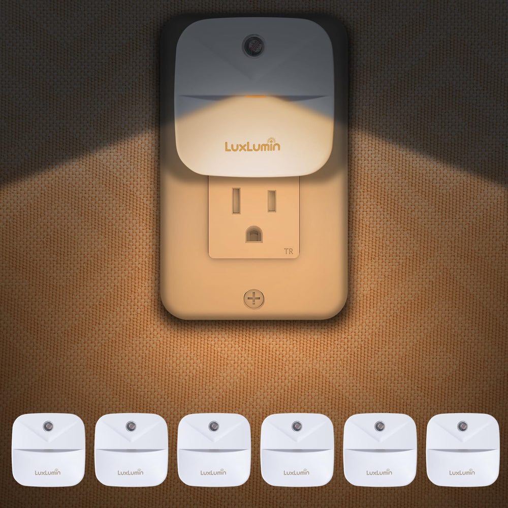 LuxLumin nightlight wall plug with dusk-to-dawn sensor provides hands-free hallway lighting.