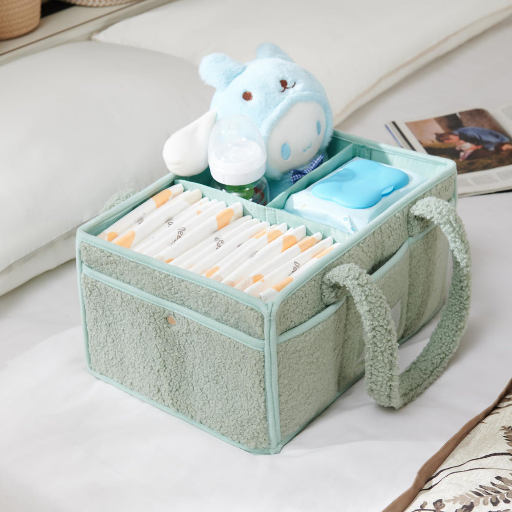 Luxury Little diaper caddy teddy bear charm adds adorable detail for gift-ready nursery décor.