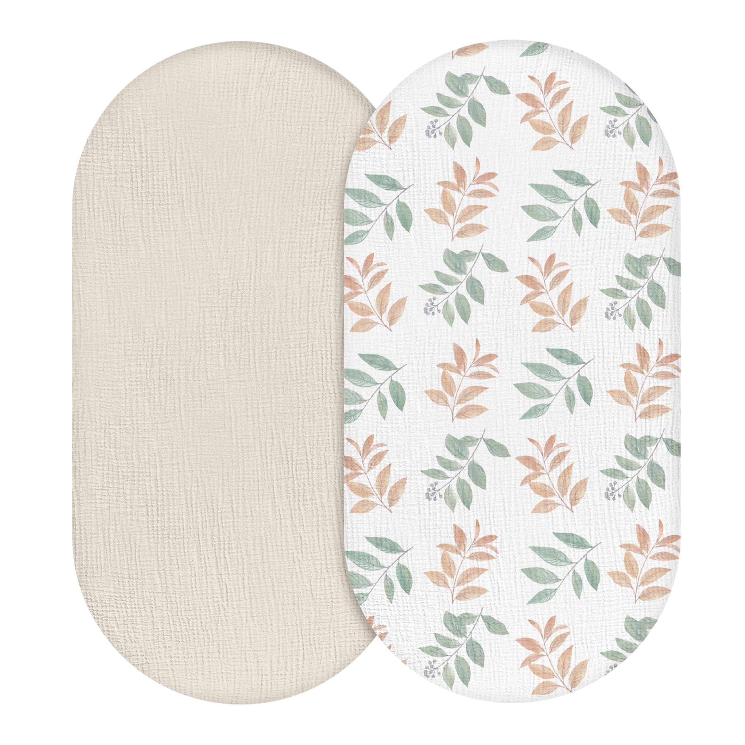 LYRICHOM BABY Bright Leaves bassinet sheet folded shows soft breathable cotton for baby's comfort.