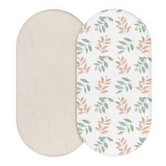 LYRICHOM BABY Bright Leaves bassinet sheet folded shows soft breathable cotton for baby's comfort.
