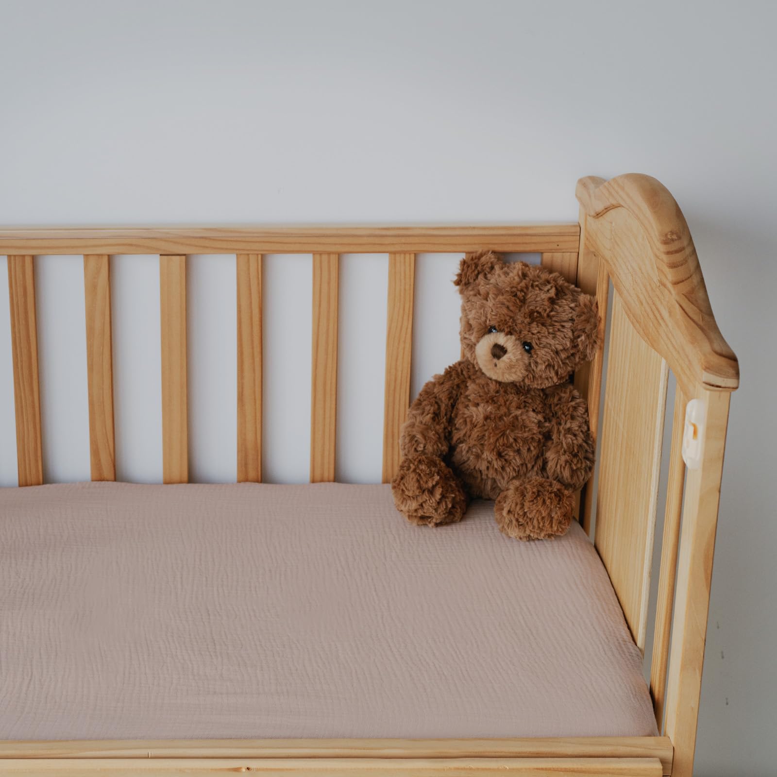 LYRICHOM BABY mini-crib sheets snug-elastic corner for secure fit during sleep.