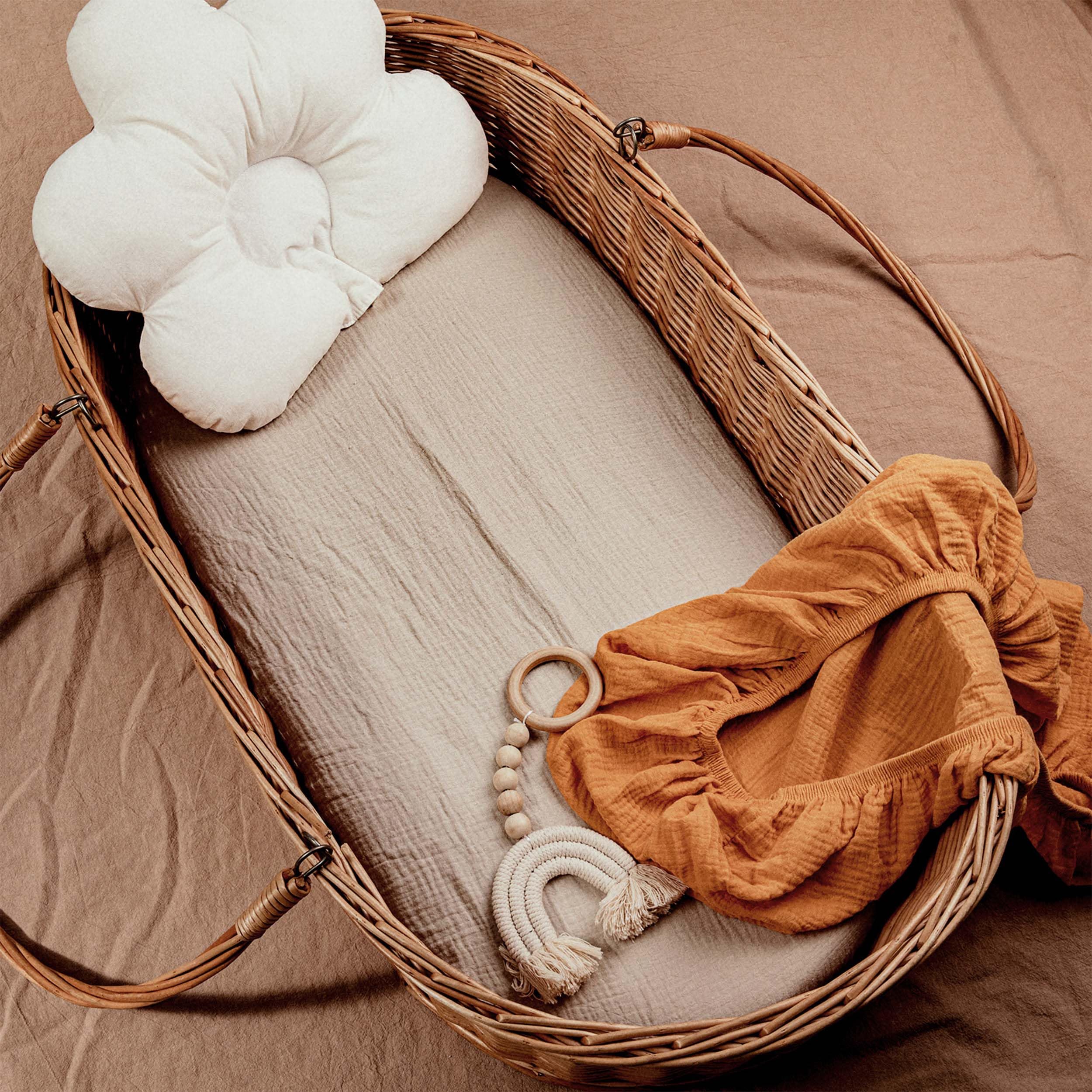 LYRICHOM BABY muslin bassinet sheet on mattress showing snug fit