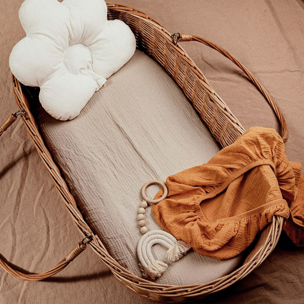 LYRICHOM BABY muslin bassinet sheet on mattress showing snug fit
