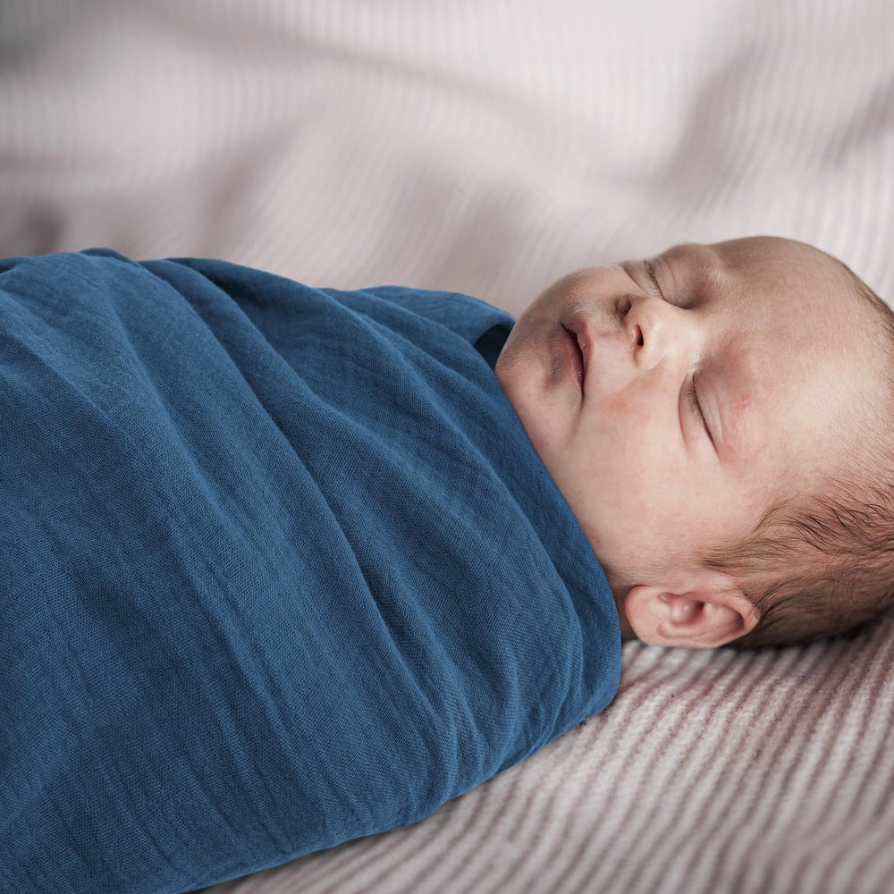 LYRICHOM BABY muslin blanket care: machine wash cold with mild detergent.