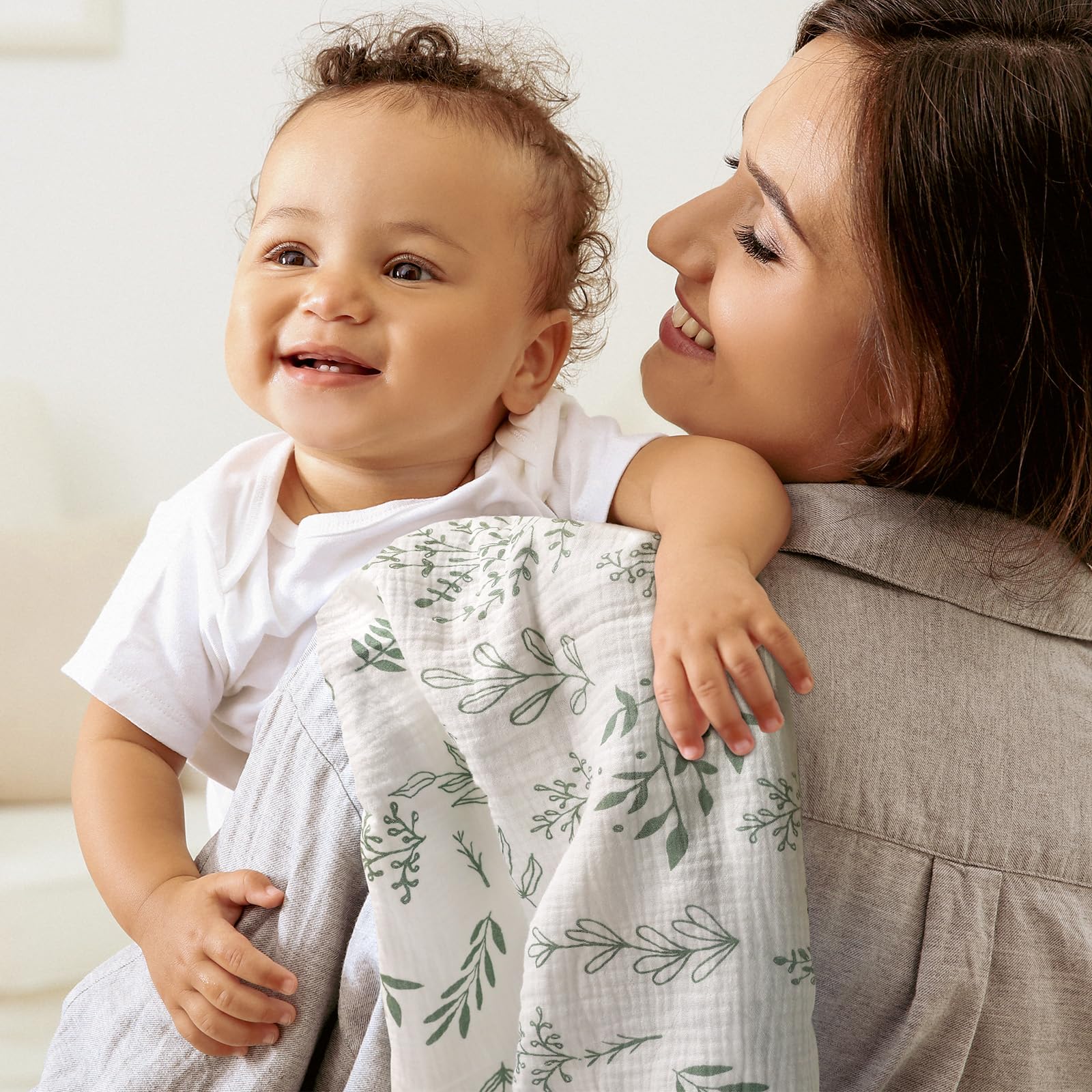 LYRICHOM BABY muslin swaddle blanket fabric closeup highlights soft texture.