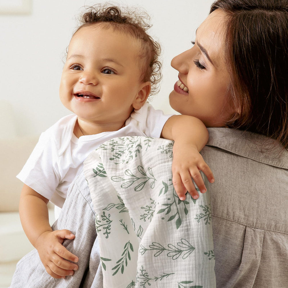 LYRICHOM BABY muslin swaddle blanket fabric closeup highlights soft texture.