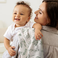 LYRICHOM BABY muslin swaddle blanket fabric closeup highlights soft texture.