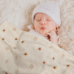 LYRICHOM BABY swaddle blanket used as stroller cover for sun protection