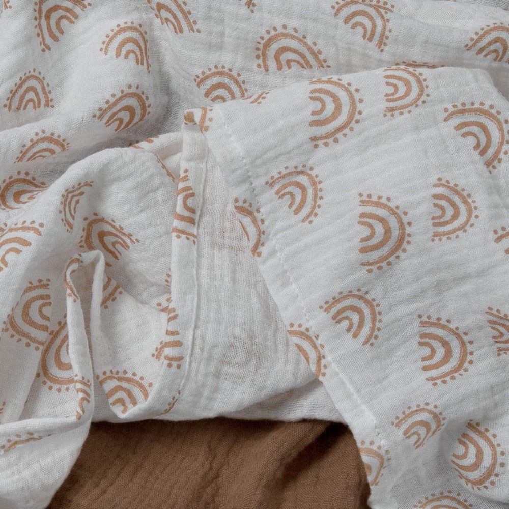 LYRICHOM BABY muslin swaddle in stroller for on-the-go comfort.