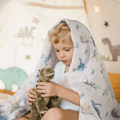 LYRICHOM BABY swaddle 38x40 inch blue dinosaur ideal for cuddles.