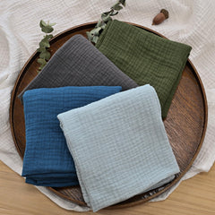 LYRICHOM BABY swaddle wrapped in blanket demonstrates secure, cozy newborn comfort.