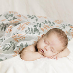 LYRICHOM BABY swaddle blanket close-up highlights high-density organic cotton and gentle touch.