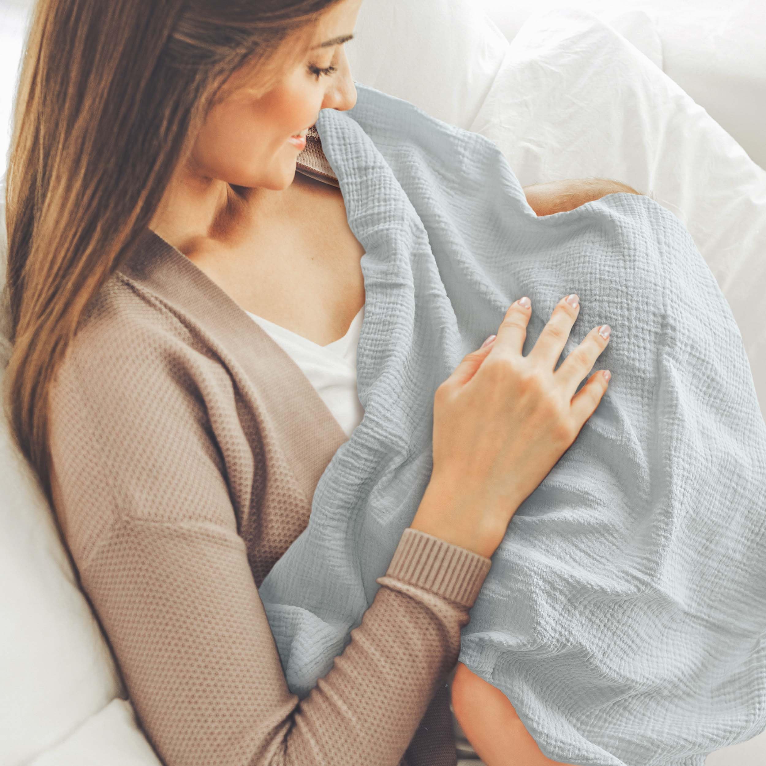 LYRICHOM BABY swaddle stroller-cover illustrates on-the-go protection from sun and wind.