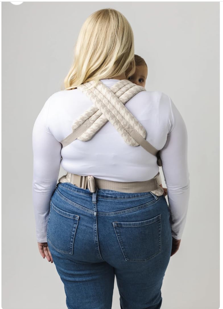 Mabe Monarch back-carry displays secure support for active parents.