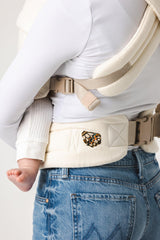 Mabē Monarch ivory front-facing-out highlights baby-facing-out while staying hands-free
