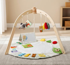Macabaka tummy time mat with five sensory zones for exploration.