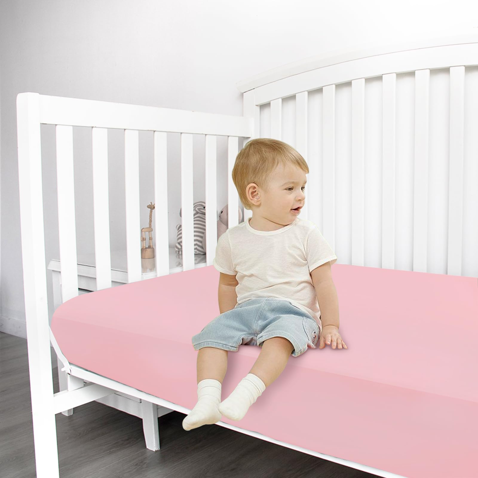 Magik & Kover 2-pack crib sheets packaging emphasizes easy care and fade resistance.