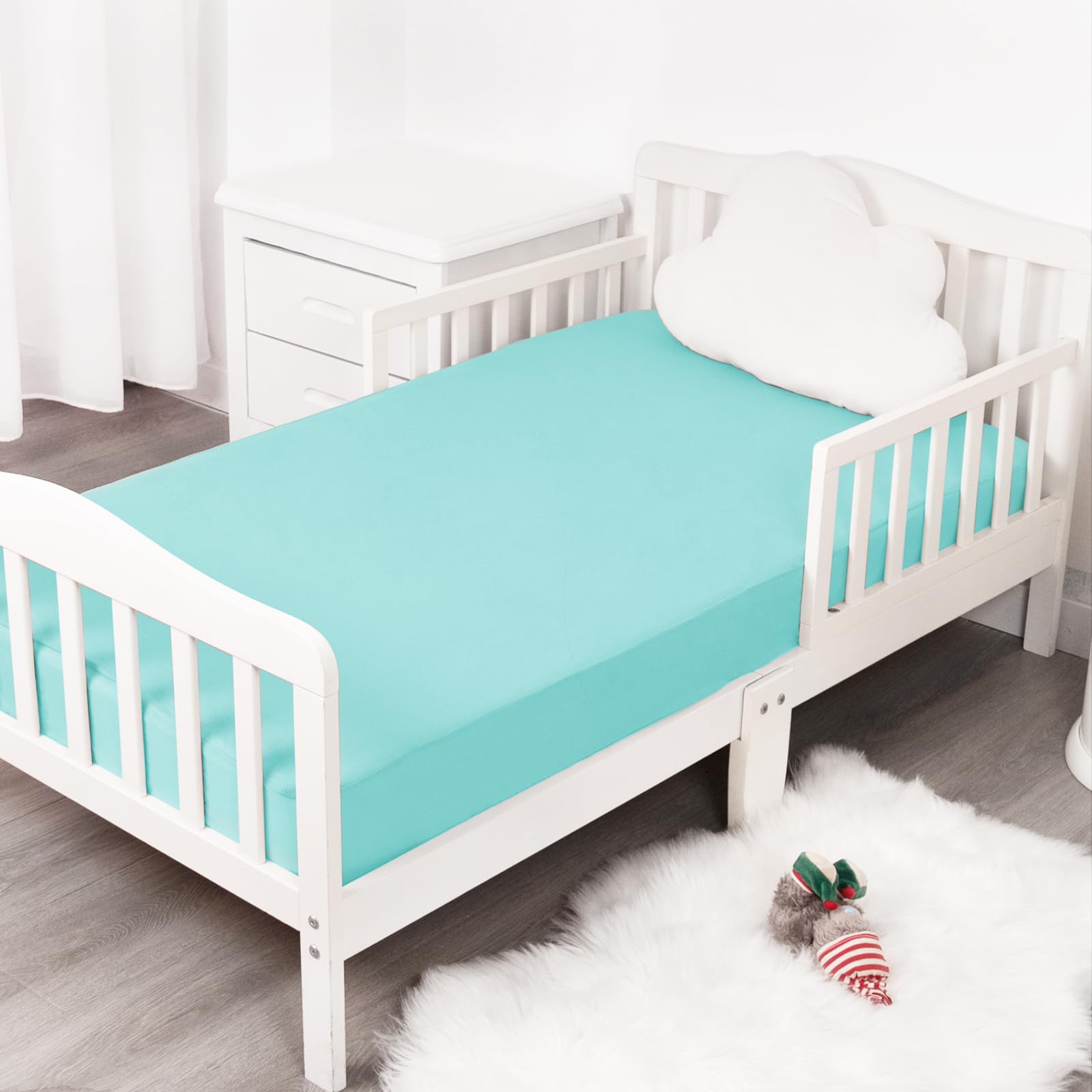 Magik & Kover compatible with standard crib and toddler mattress sizes for versatility.