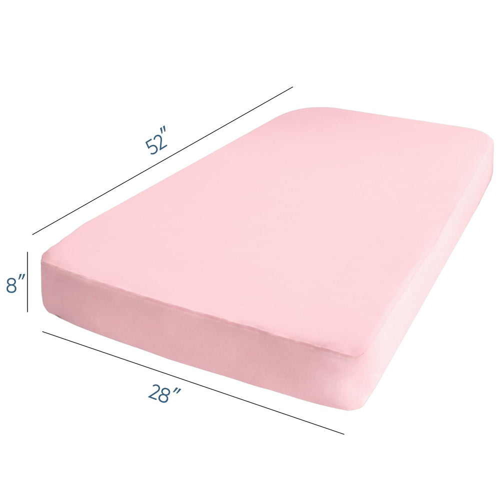 Magik & Kover 52x28 crib sheet on standard crib demonstrates easy slip-on access.