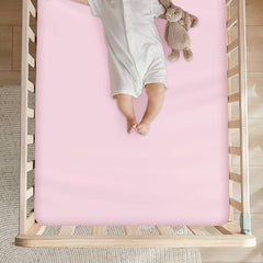 Soft and breathable Magik & Kover sheet ensures comfy naps.