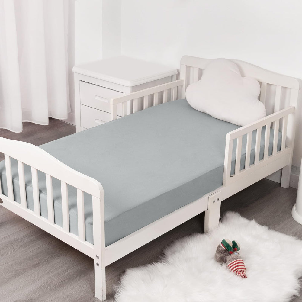 Magik & Kover neutral gray and black pack complements nursery decor.