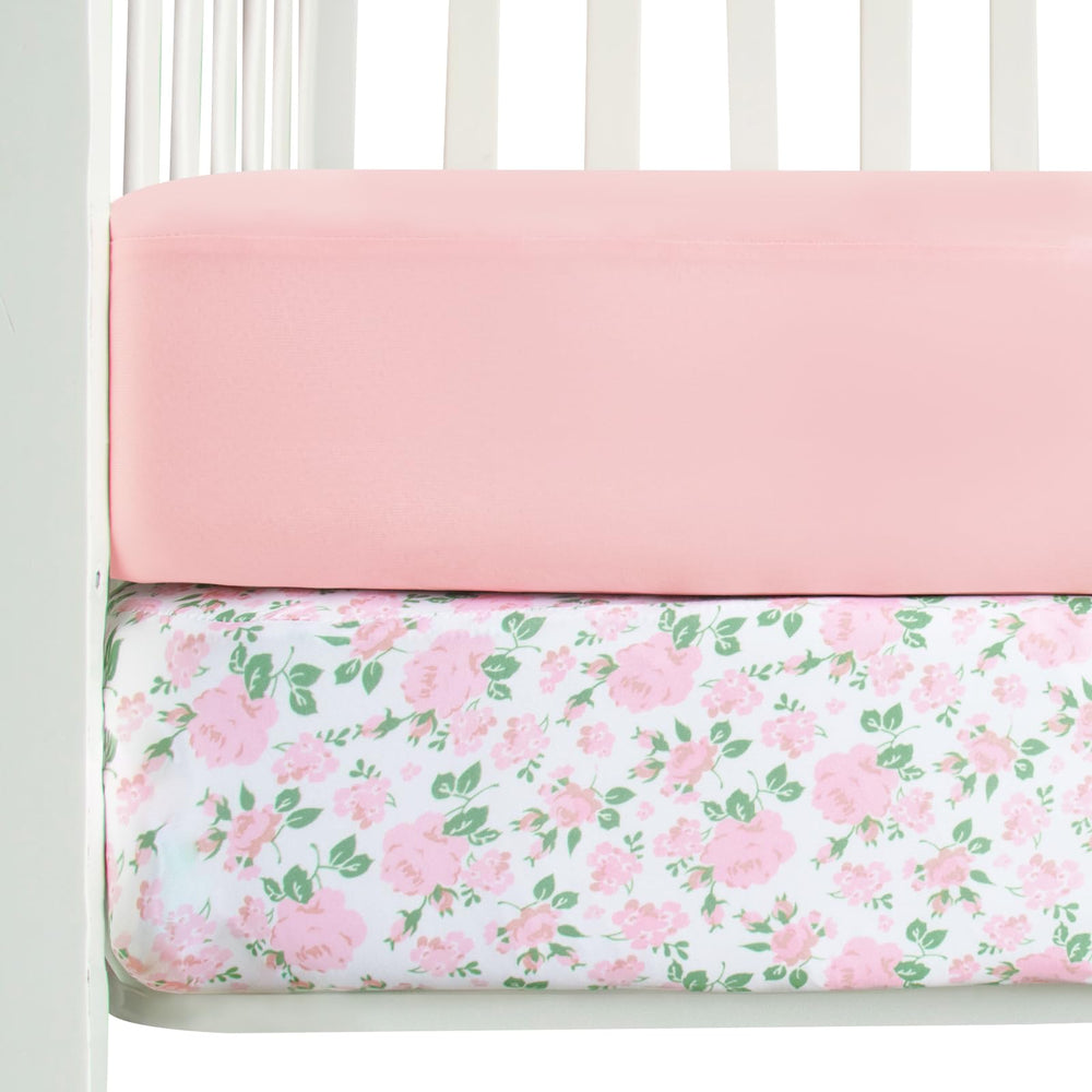 Magik & Kover pink floral stretchy crib sheets offer gentle, breathable baby sleep.