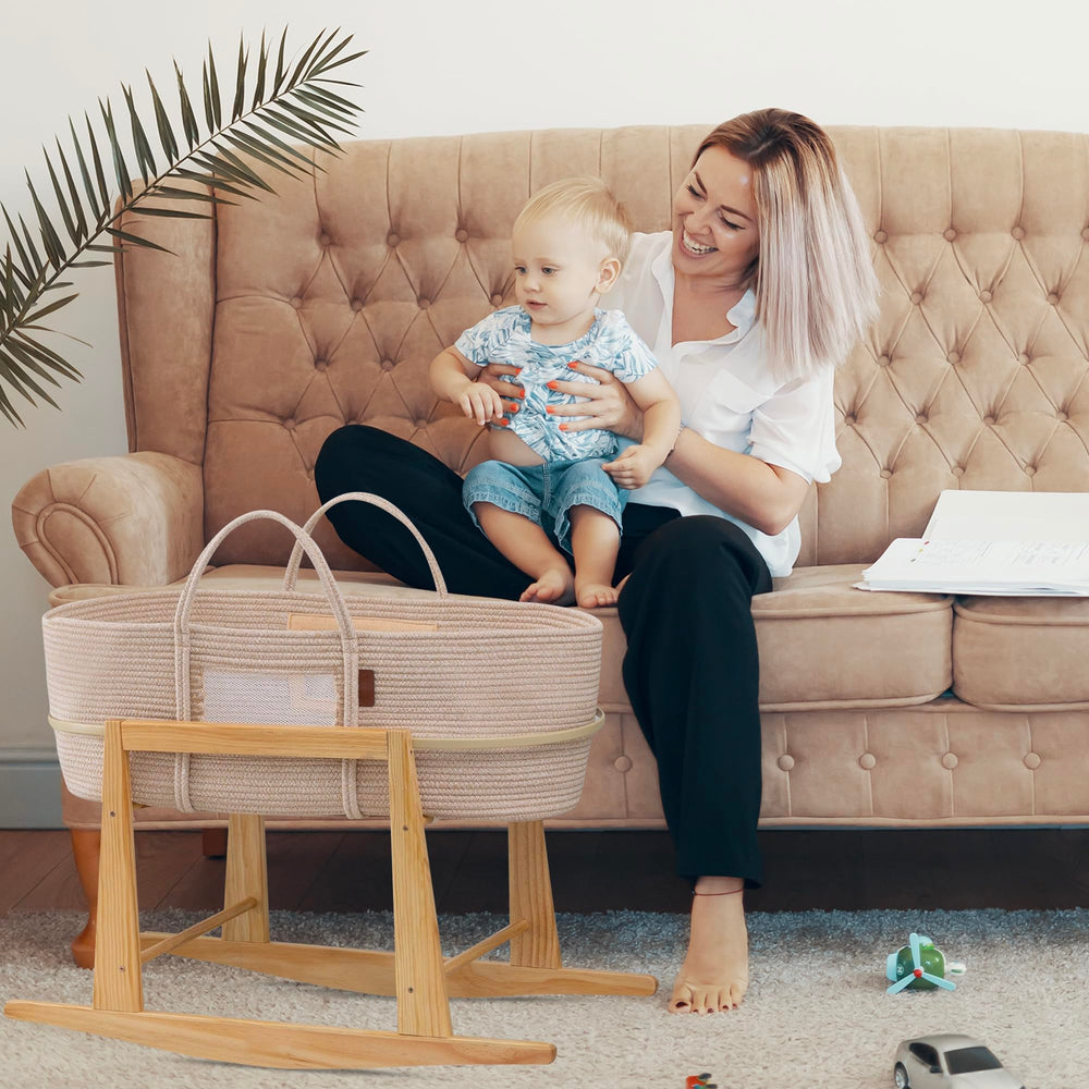 Mainefield Pacific Moses Basket Stand includes bonus change mat for quick diaper changes.