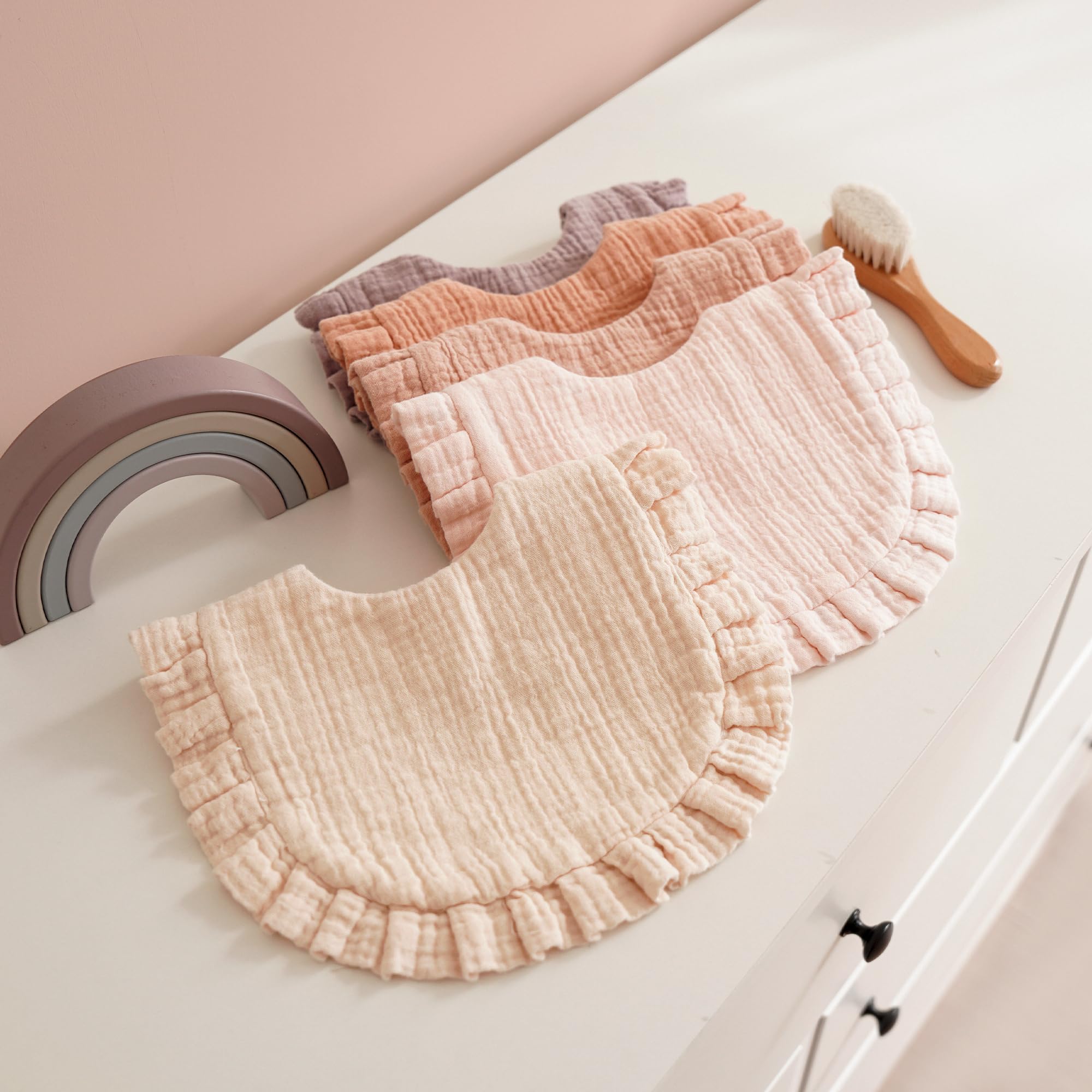 MairMore colors variety bib stack showcases playful outfits.