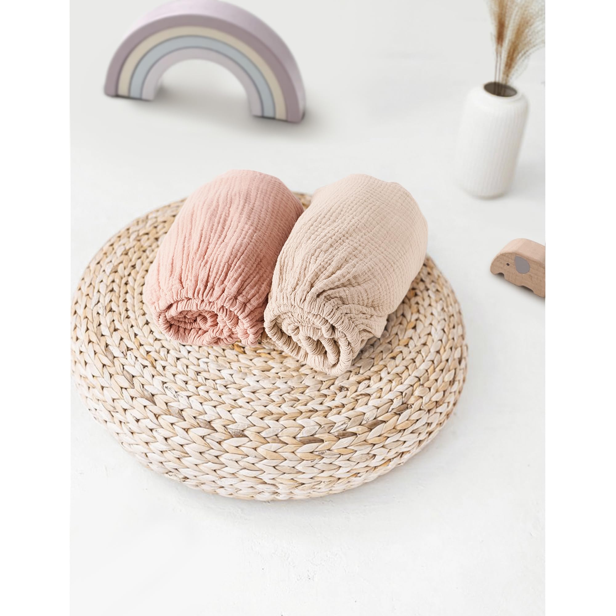 MairMore Muslin Bassinet Sheet neutral tone enhances nursery decor.