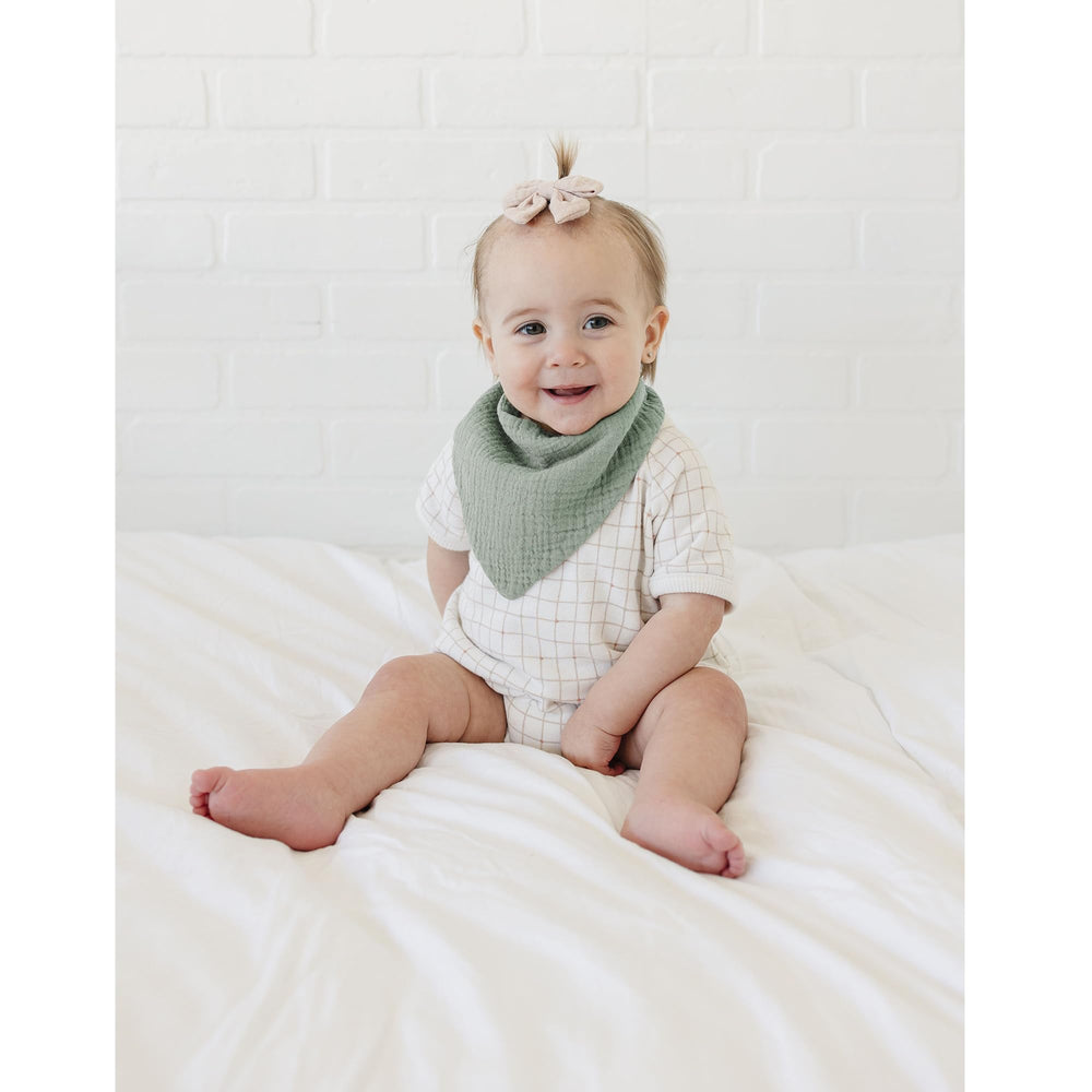 MairMore muslin bib used as drool catcher highlights versatile, multi-use design.