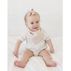 MairMore muslin bibs in neutral colors appear stylish and gender-neutral.