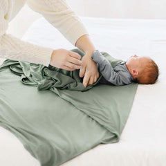 MairMore swaddle set includes name sign, creating a cherished keepsake.