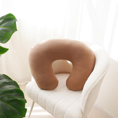 MairMore nursing pillow cover zipper closeup shows secure fit during feeding.