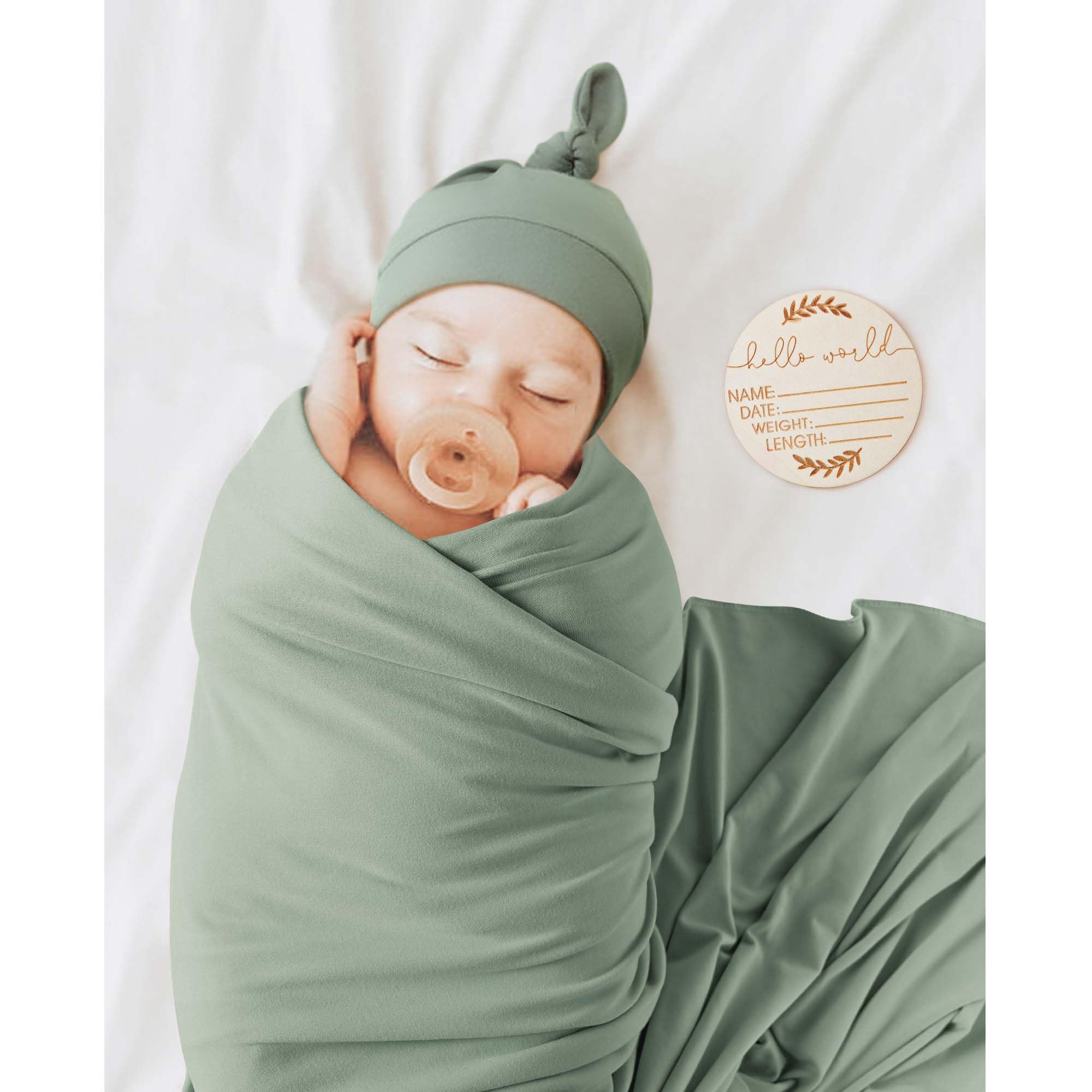MairMore swaddle solid color design highlights timeless elegance for nursery photos.
