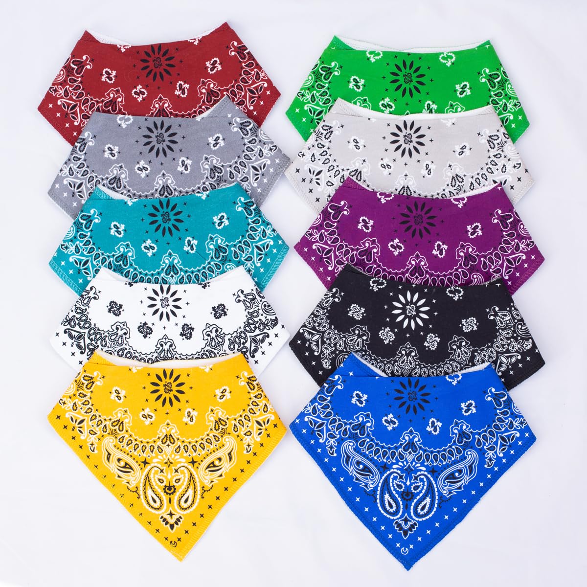 Maiwa triangle bibs show adjustable snaps for growing babies secure fit.