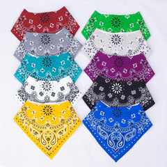 Maiwa triangle bibs show adjustable snaps for growing babies secure fit.