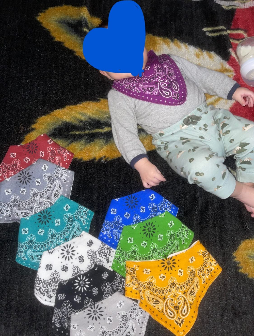 Maiwa drool bibs designed to catch messes and simplify cleanup.