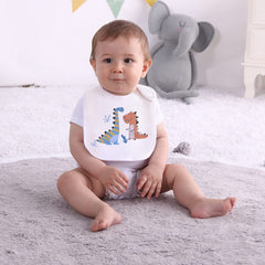 Maiwa dinosaur bibs material close-up showing soft cotton interlock and breathable back layer