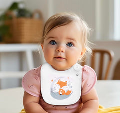 Maiwa bibs with adjustable snaps for a secure fit as babies grow