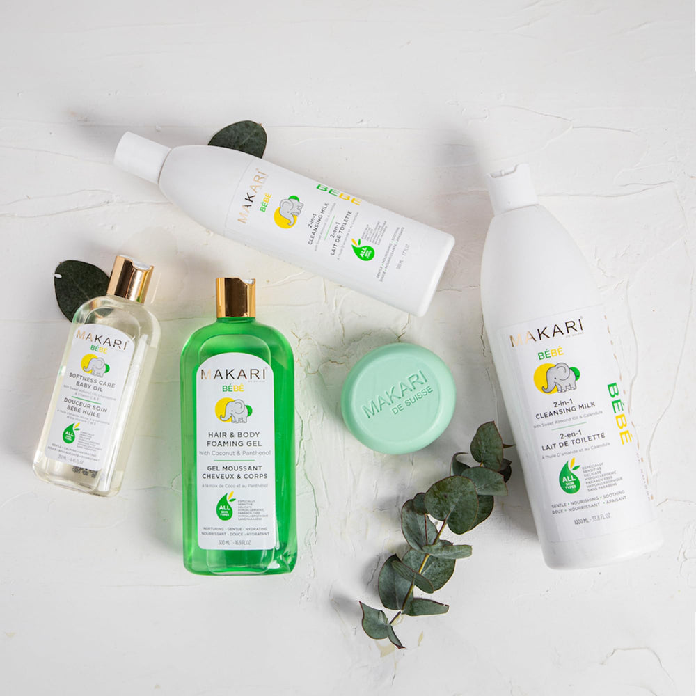 Makari Softness Care Baby Oil paraben-free badge visible on bottle.