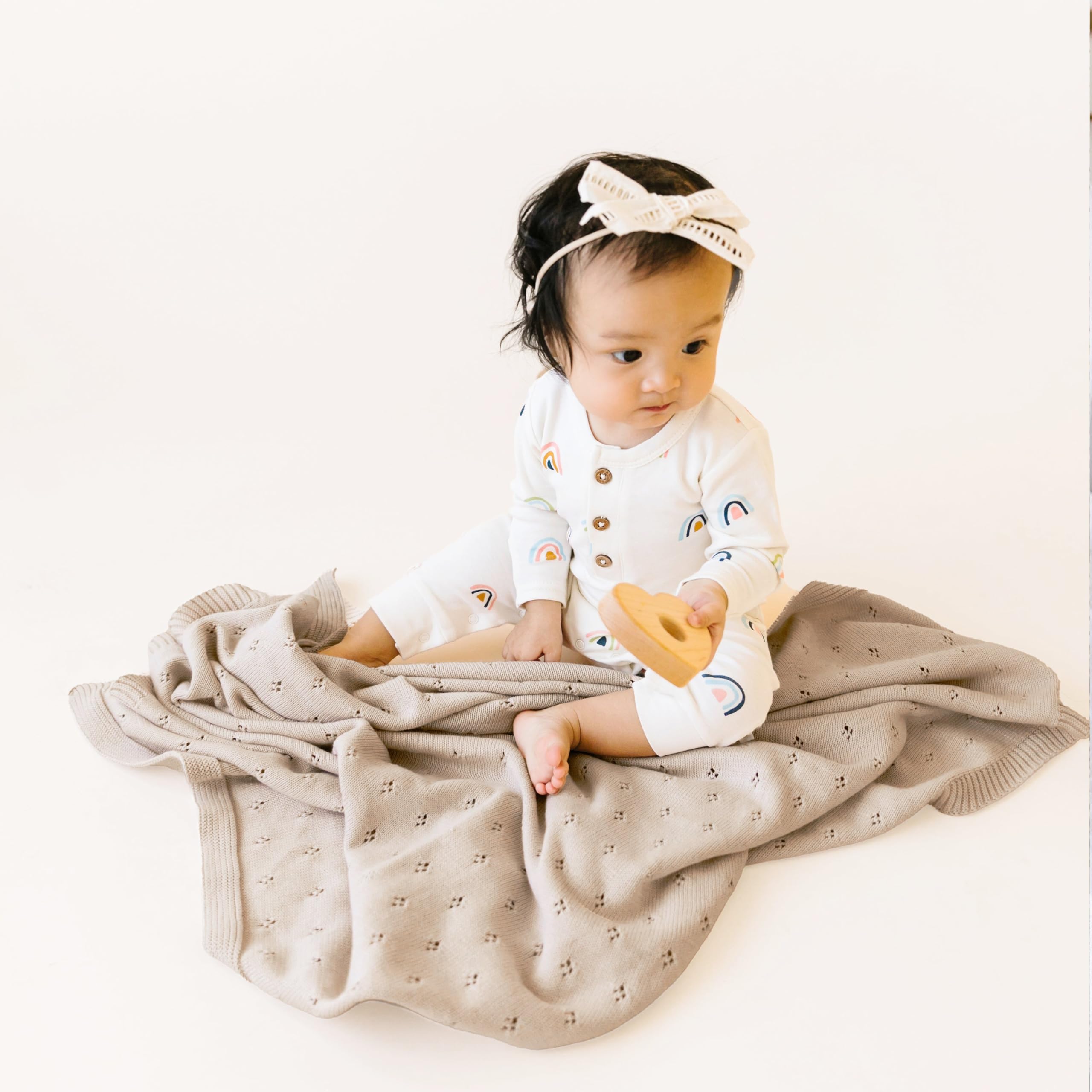 MakeMake Organics baby blanket beige-stroller-cover shows versatile all-season use for on-the-go comfort.