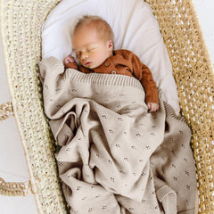 MakeMake Organics baby blanket beige-texture reveals breathable pointelle knit ideal for airy warmth.
