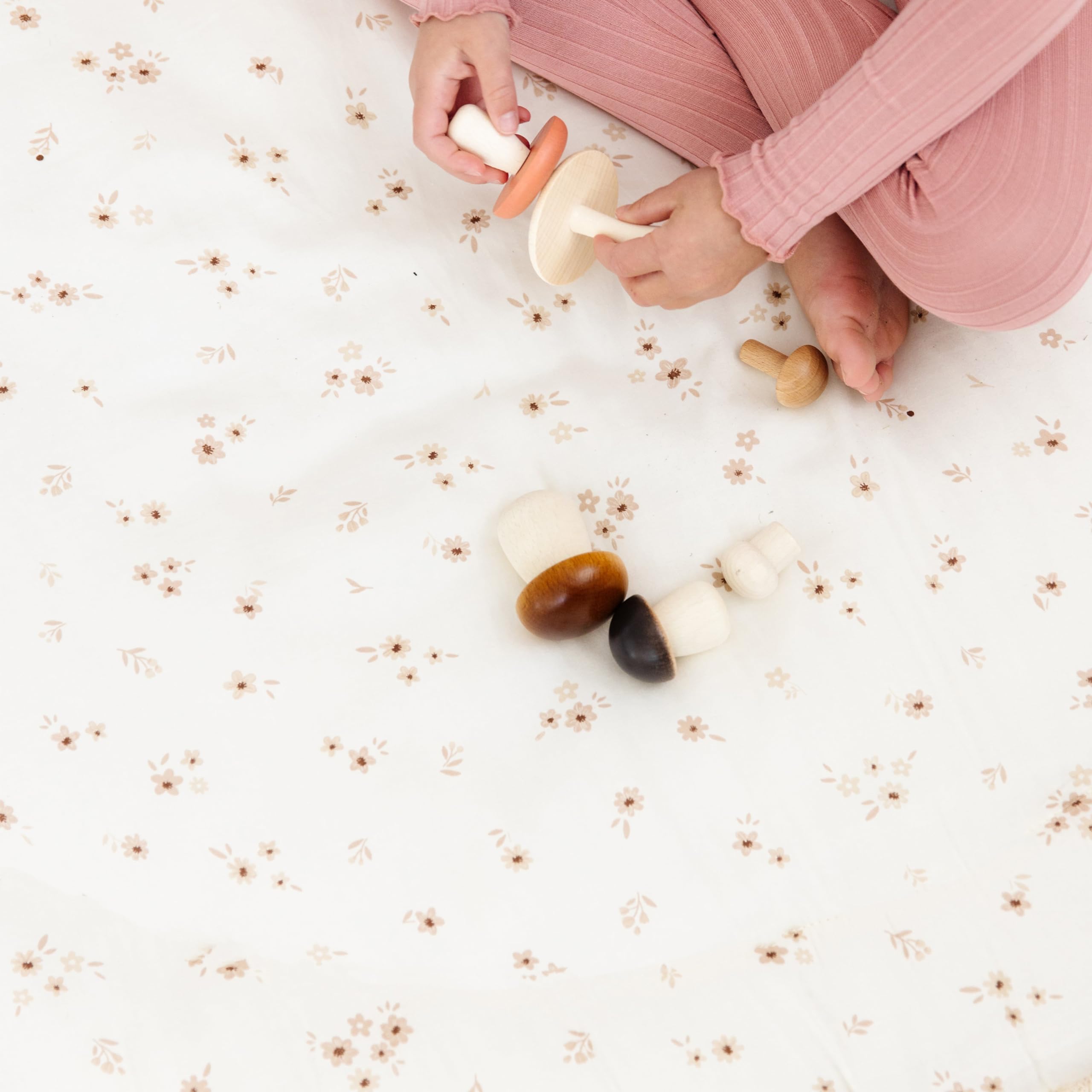 Makemake Organics Bloom close-up fabric view highlights sateen softness and tight weave.
