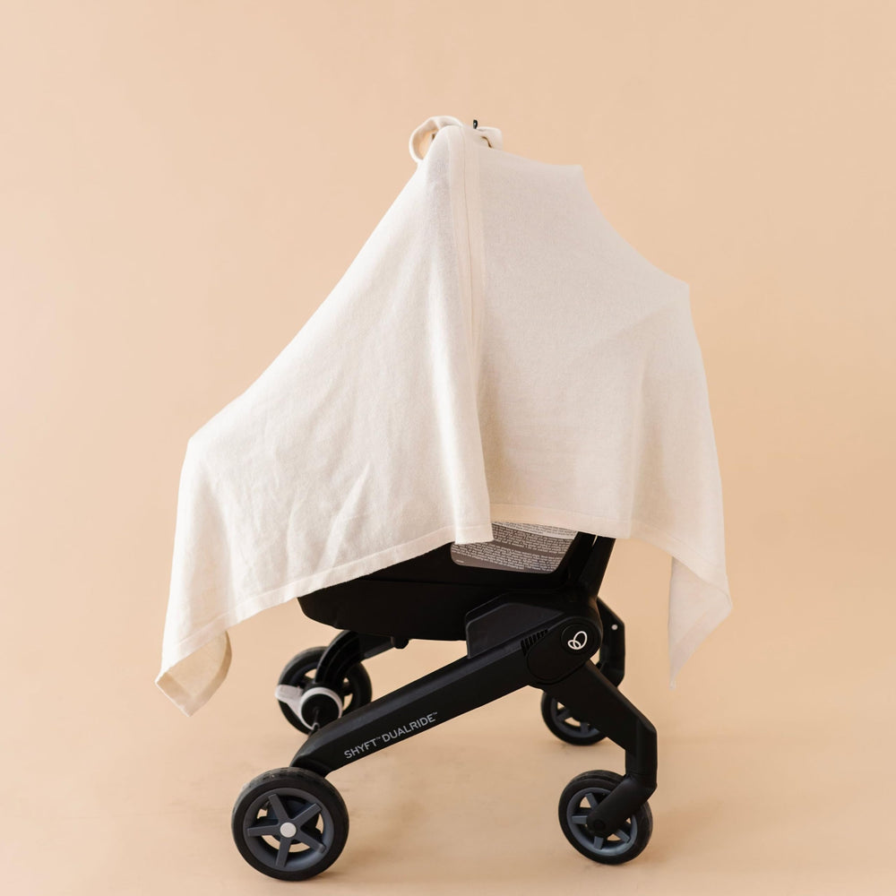 MakeMake Organics knit nursing cover vanilla cape-shawl use shows versatile wrap option