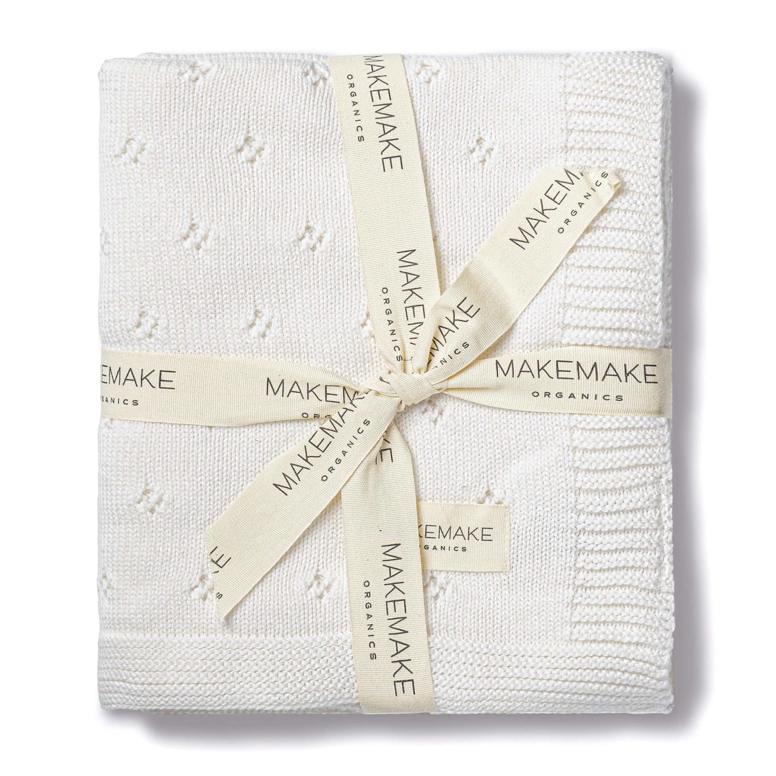 Makemake Organics pointelle-knit closeup: breathable texture and delicate drape for everyday comfort.