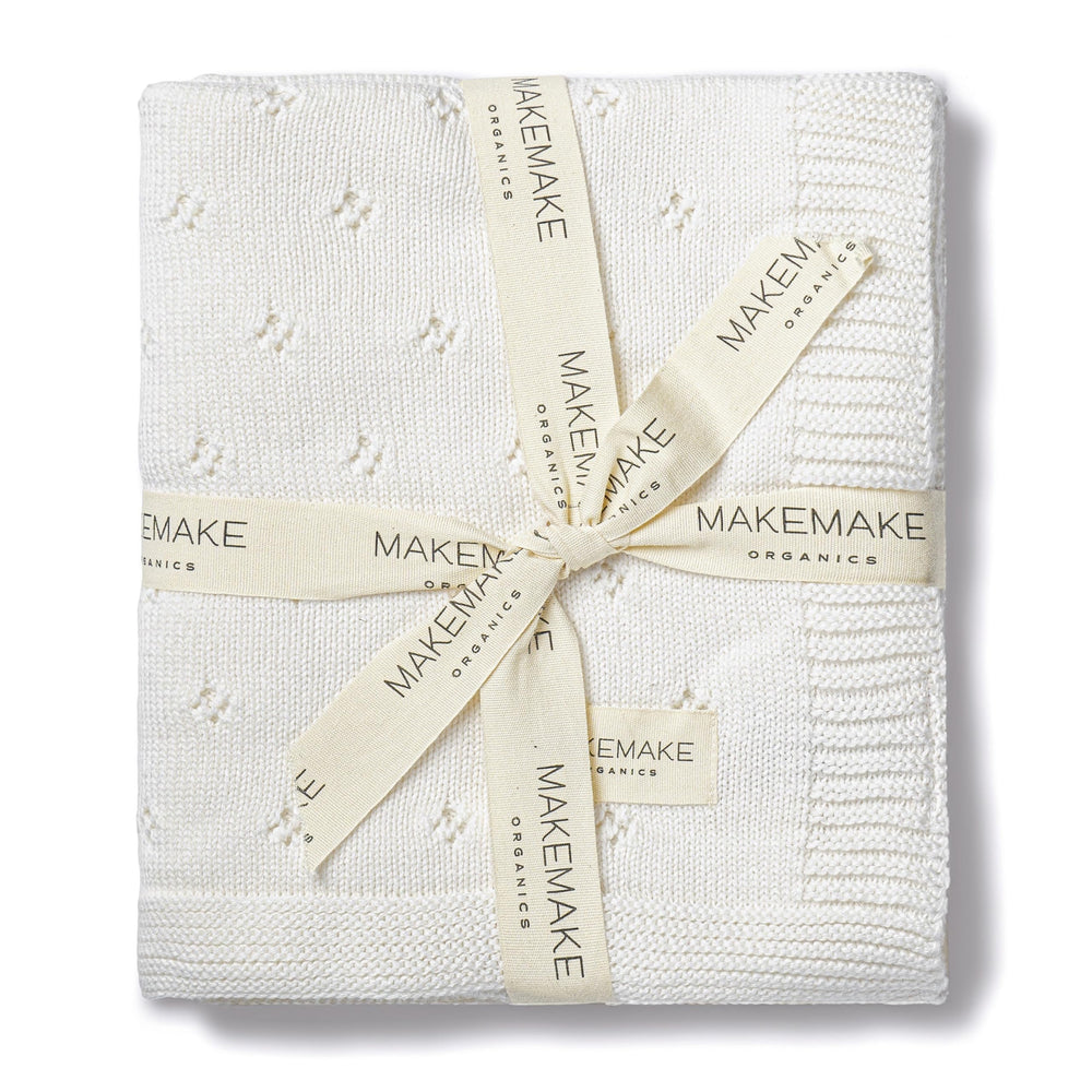 Makemake Organics pointelle-knit closeup: breathable texture and delicate drape for everyday comfort.