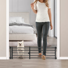 Malier indoor dog gate with door close-up highlights sturdy metal build for safe doorways.