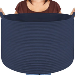 Maliton extra-large basket storing blankets in the living room for clutter-free space.