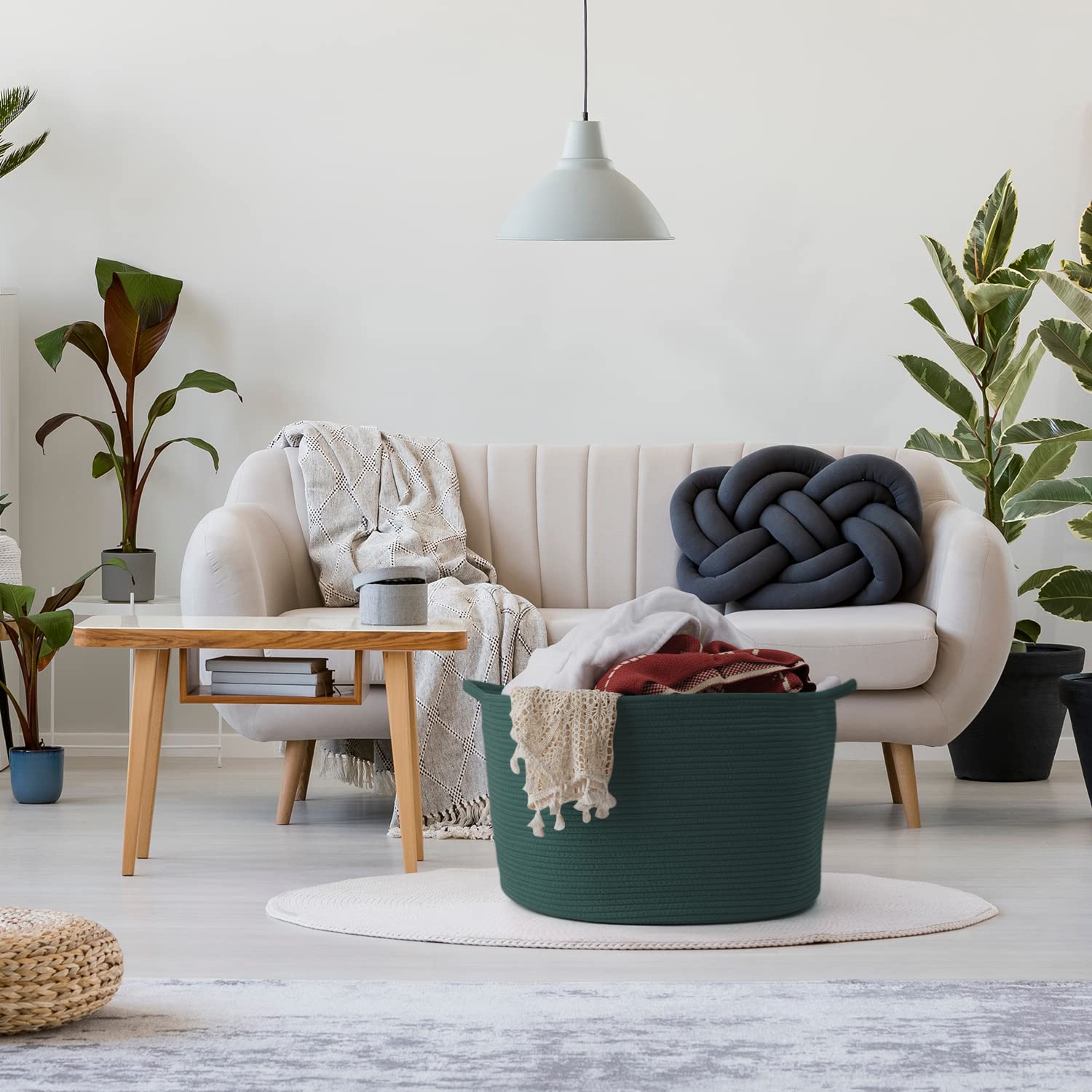 Maliton green laundry hamper in woven style adds soft texture to space.