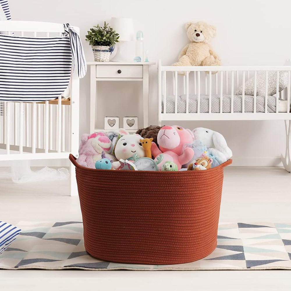 Maliton basket with blankets neatly arranged for cozy bedroom storage.